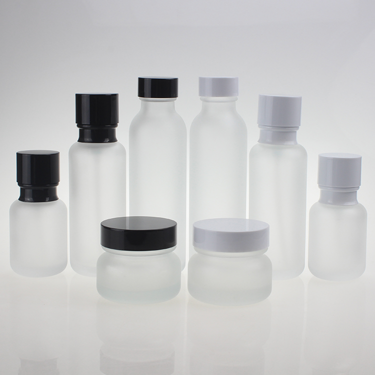 Wholesales empty  matte clear glass 50ml 110ml 150ml Lotion Pump Bottle and cream jar in 50g with white or black cap