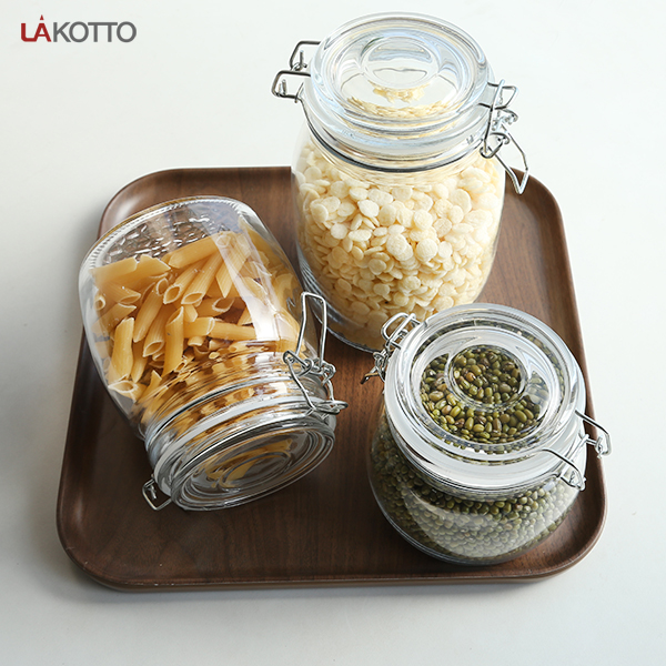 Wholesales factory price glass jar with metal clip glass storage jar bottle with flip top cap