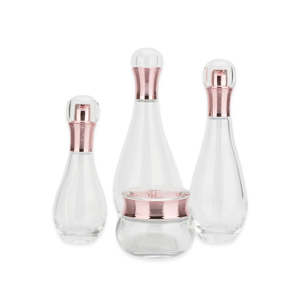 Wholesales high-grade Bowling shape clear cosmetics electroplating glass bottle and jars with good price rose golden lids