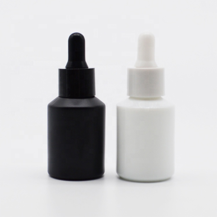 Whosale guangzhou 30ml frosted black white glass dropper bottle for oil packaging