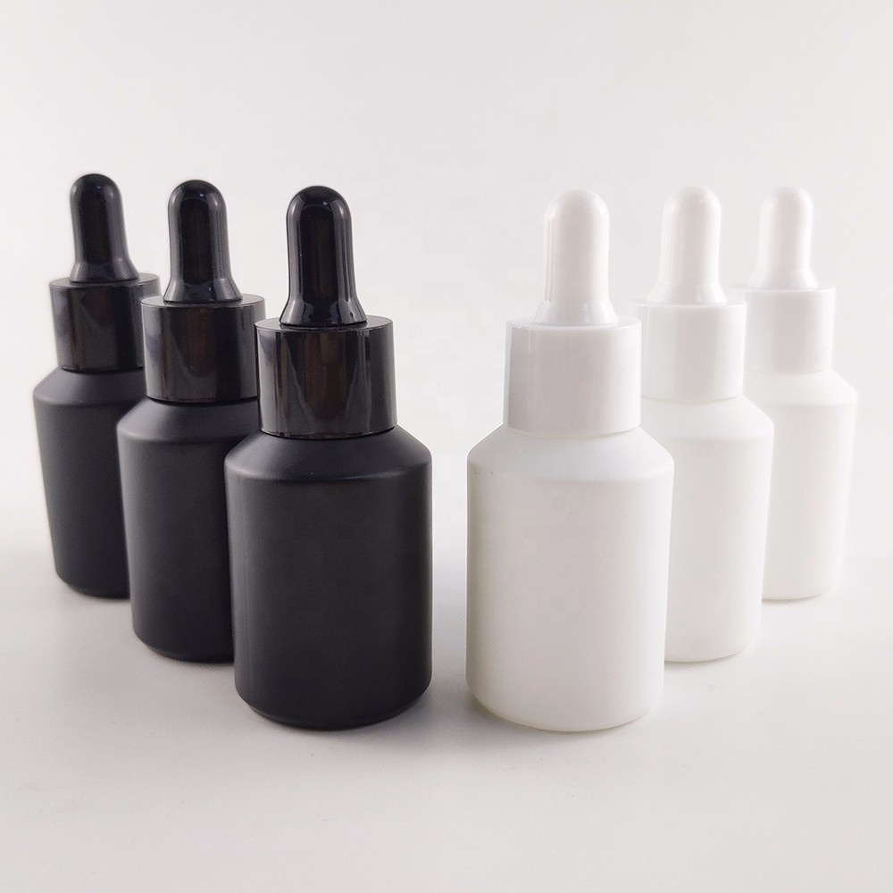 Whosale guangzhou 30ml frosted black white glass dropper bottle for oil packaging