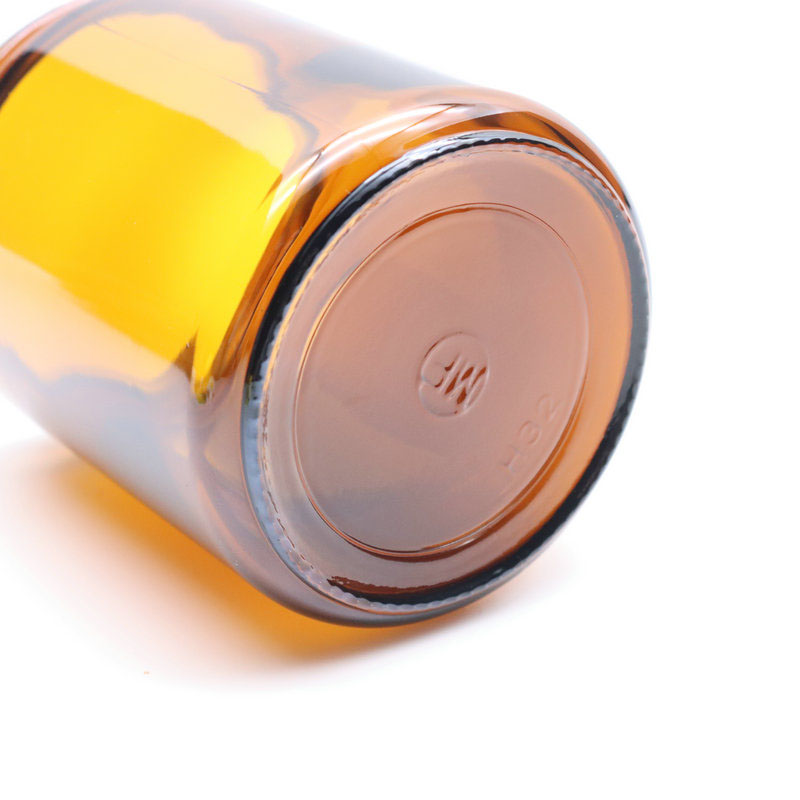 Wide mouth uv protected round 8 Ounce amber glass cream jar