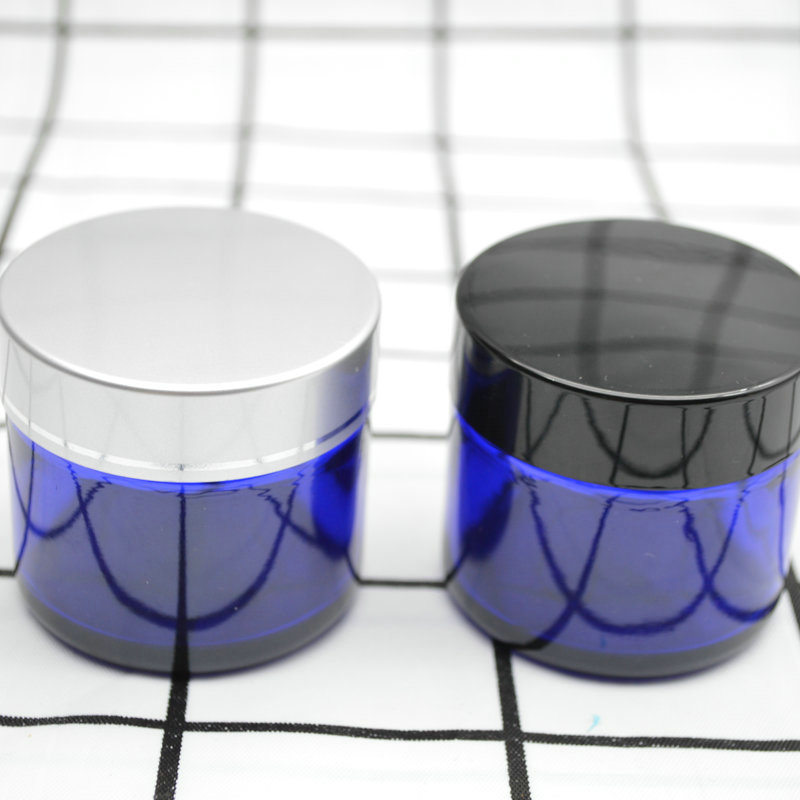 Xuzhou Abeisi free sample cosmetic face lotion container 60g 60ml cobalt blue face cream jar with black silver caps