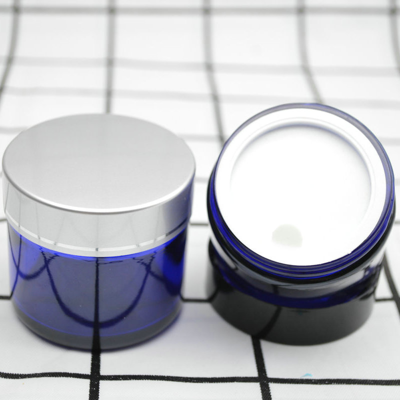 Xuzhou Abeisi free sample cosmetic face lotion container 60g 60ml cobalt blue face cream jar with black silver caps