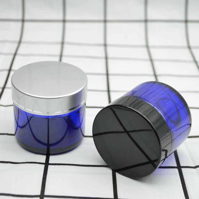 Xuzhou Abeisi free sample cosmetic face lotion container 60g 60ml cobalt blue face cream jar with black silver caps