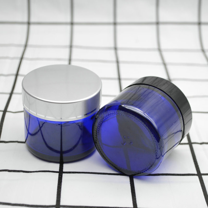 Xuzhou Abeisi free sample cosmetic face lotion container 60g 60ml cobalt blue face cream jar with black silver caps