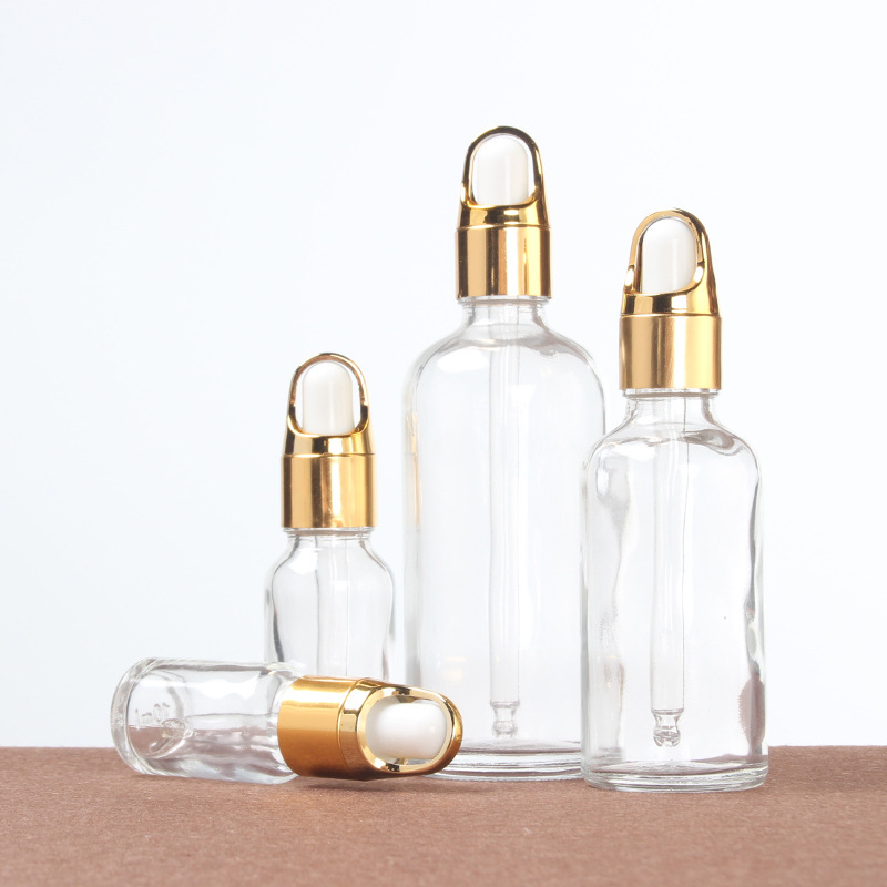 accepted customization hot sale cosmetic glass packaging dropper bottle for essential oil and skin cream glass dropper bottles