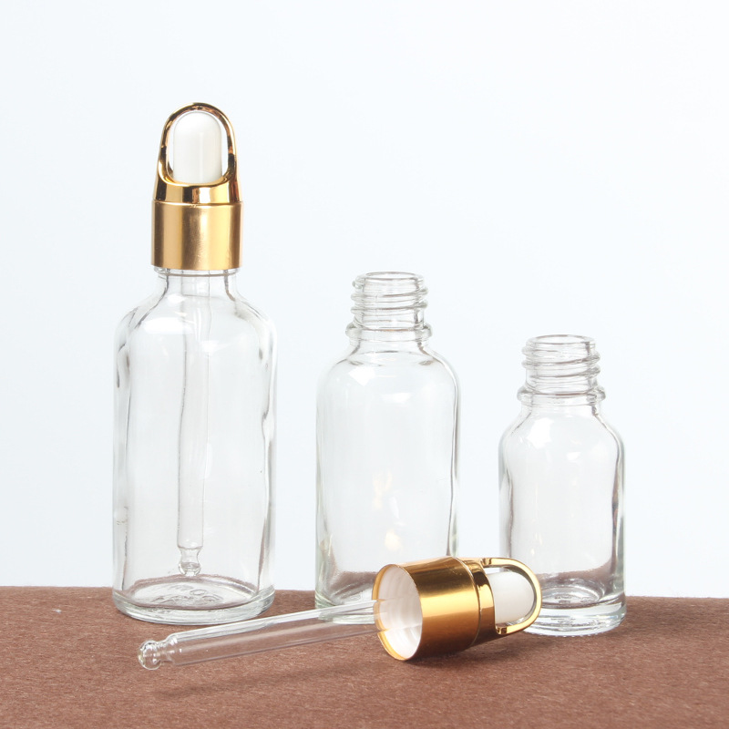 accepted customization hot sale cosmetic glass packaging dropper bottle for essential oil and skin cream glass dropper bottles