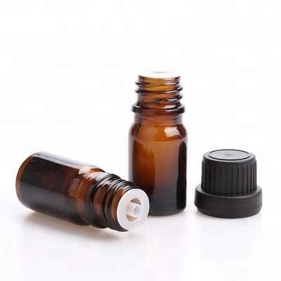 amber color glass essential oil bottle with cap