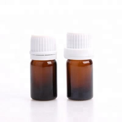 amber color glass essential oil bottle with cap