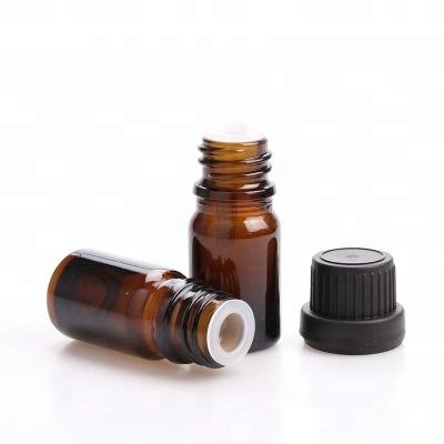 amber color glass essential oil bottle with cap