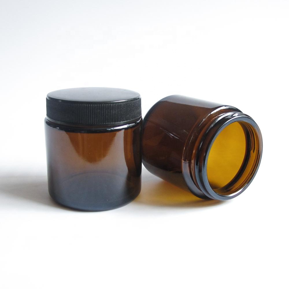 amber glass jar with Black screw cap and spacer