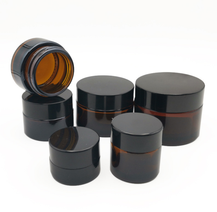 amber glass jar with black plastic cap cosmetic make up packing 10g