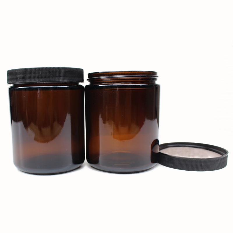 amber tinted glass candle jar with wide mouth black cover