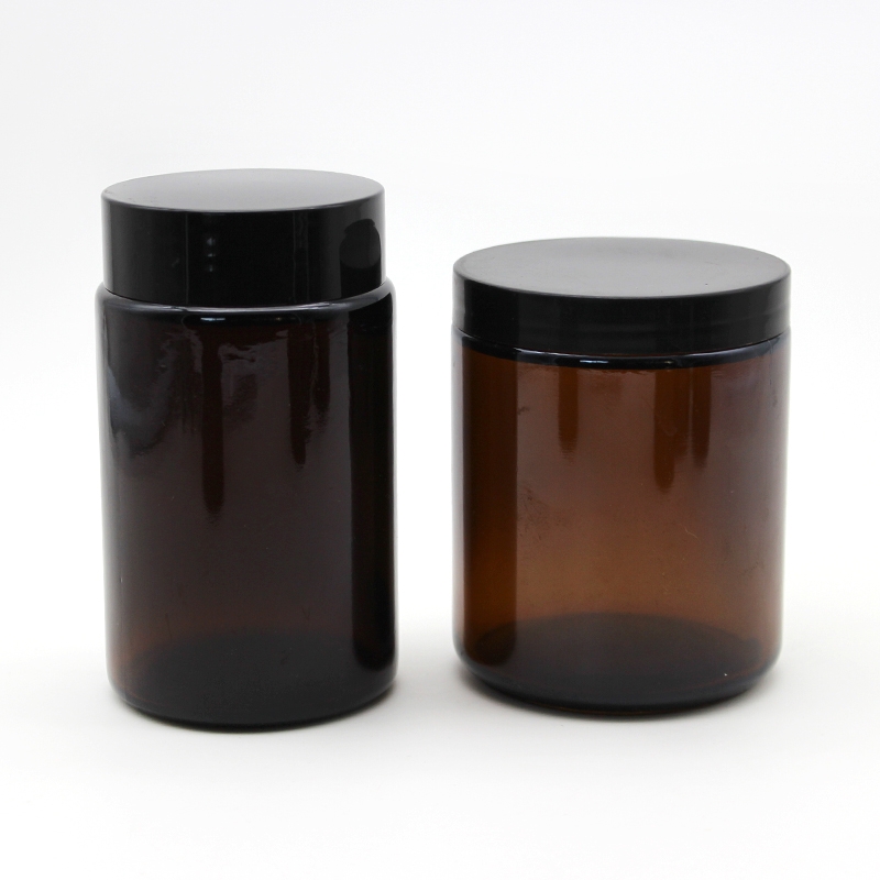 amber tinted glass candle jar with wide mouth black cover