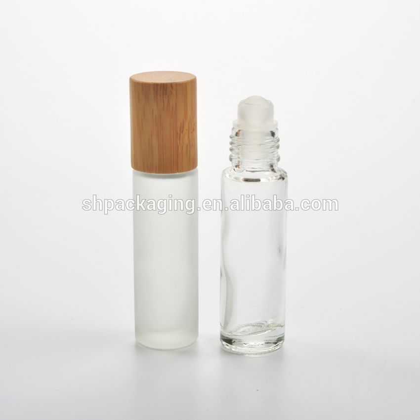 bamboo cap empty roll on glass bottle 10 ml roller ball perfume bottle with bamboo lid 15ml roll on bottle