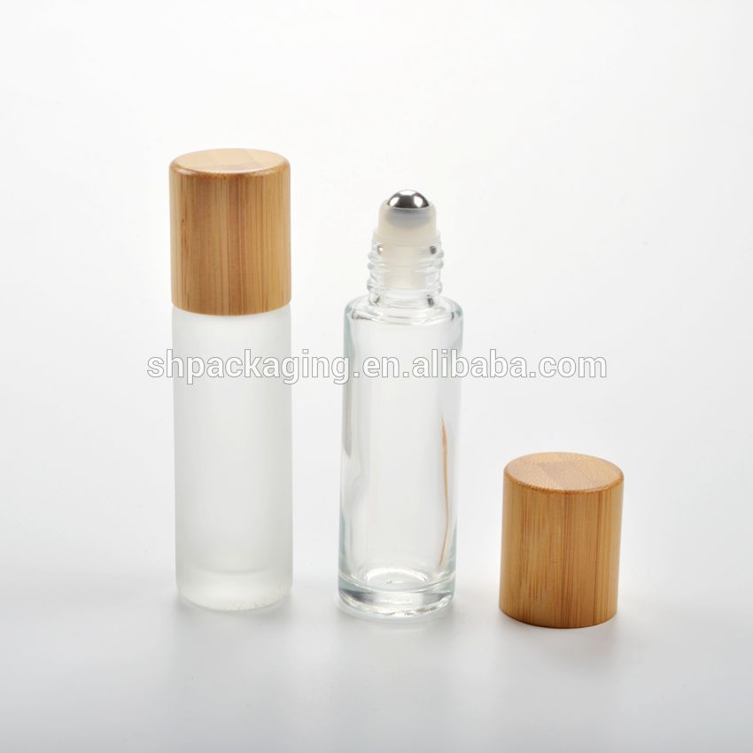 bamboo cap empty roll on glass bottle 10 ml roller ball perfume bottle with bamboo lid 15ml roll on bottle