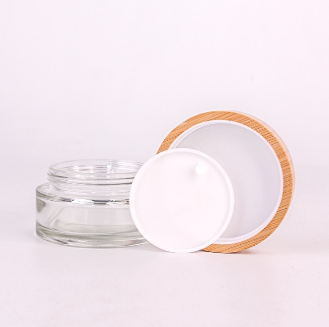 bamboo cosmetic packaging 20ml 30ml 50ml 100mlclear frosted glass jar with natural engraved LOGO bamboo lid
