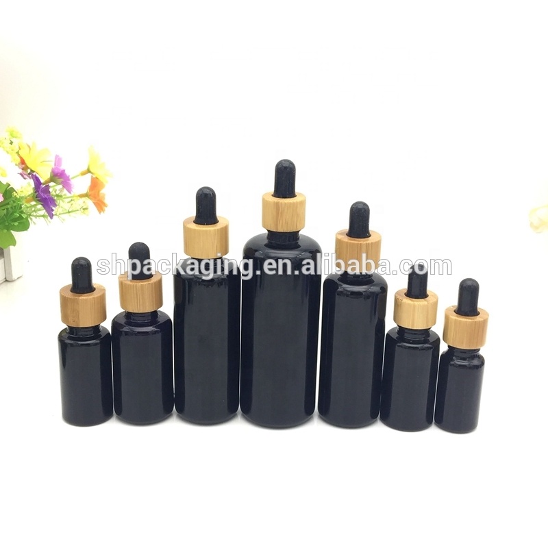 bamboo cosmetic packaging bamboo cap and pump ultraviolet glass bottle empty black cosmetic shampoo bottle and glass jars