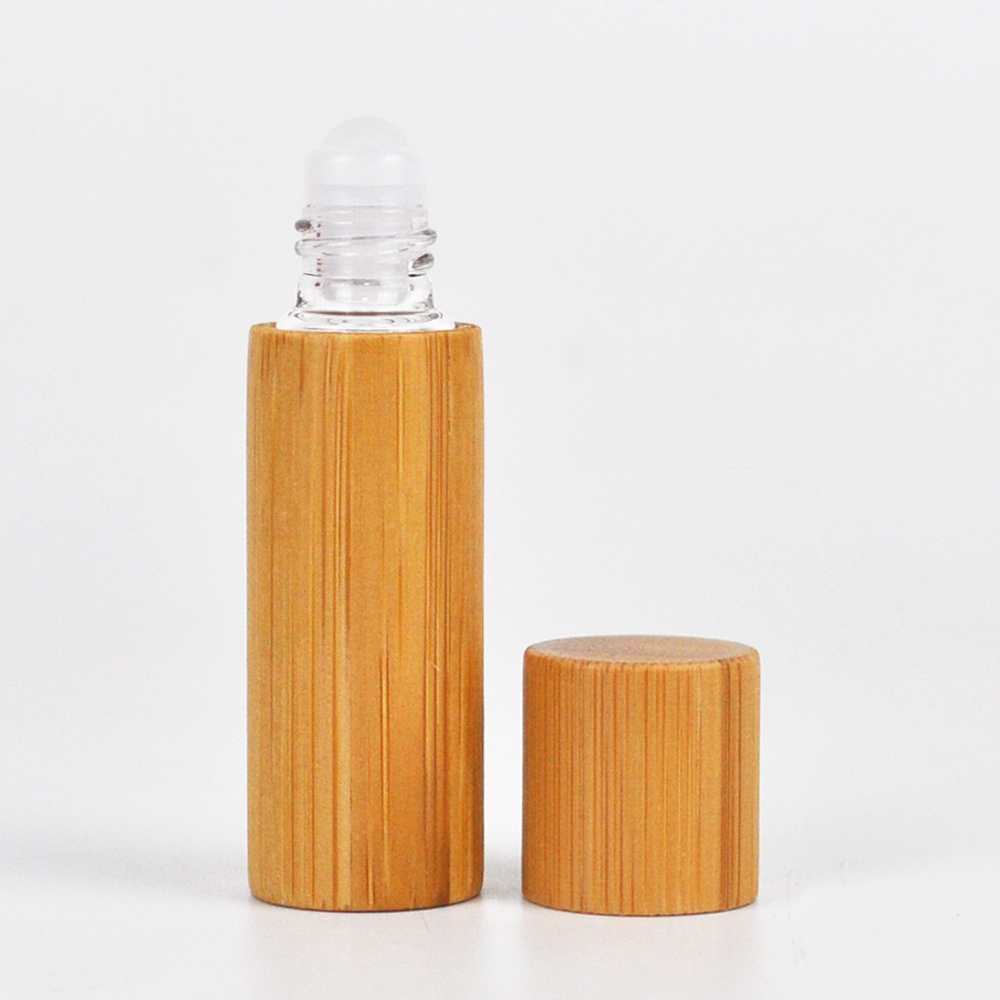 bamboo packaging custom roll on glass bottle with stainless steel ball woman face watch