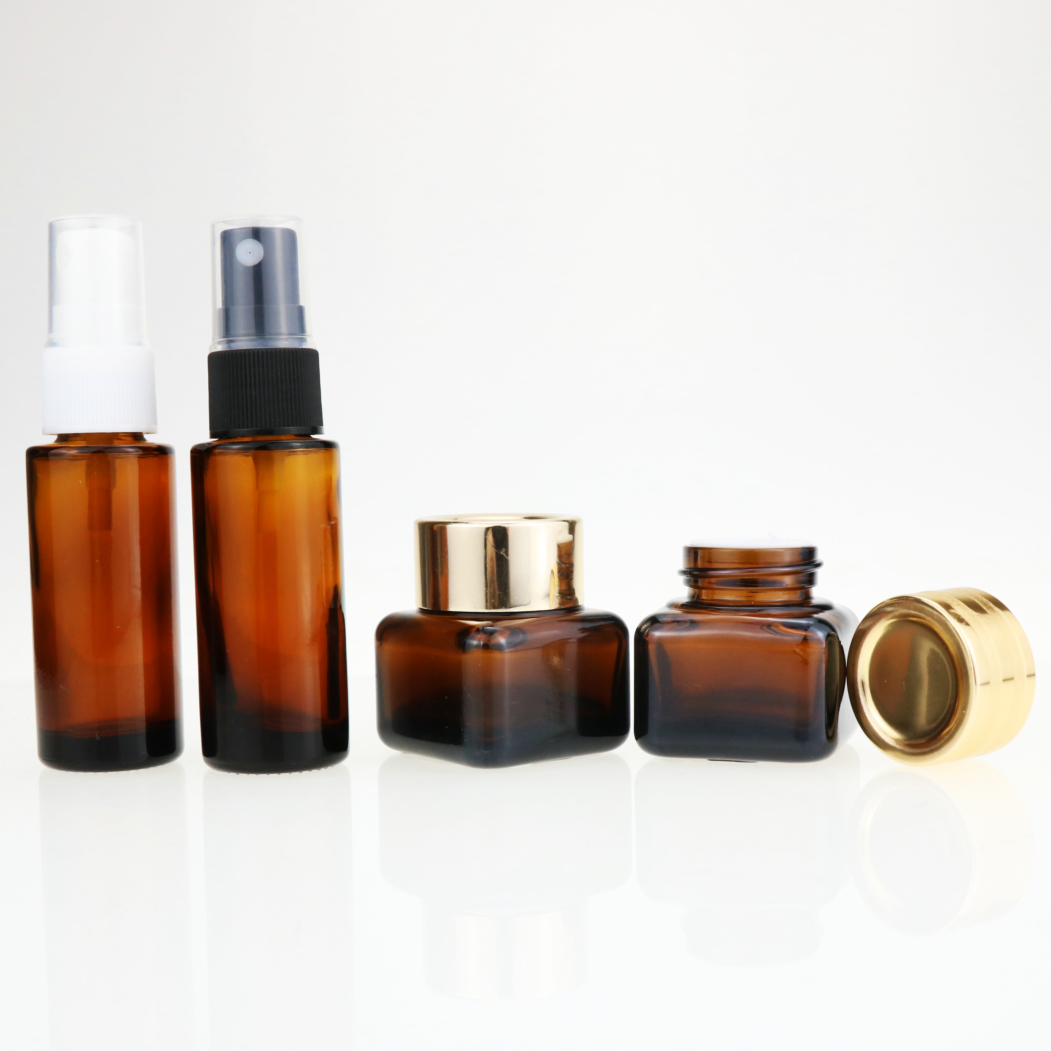 bamboo wood container and skincare packaging frosted glass cream jar