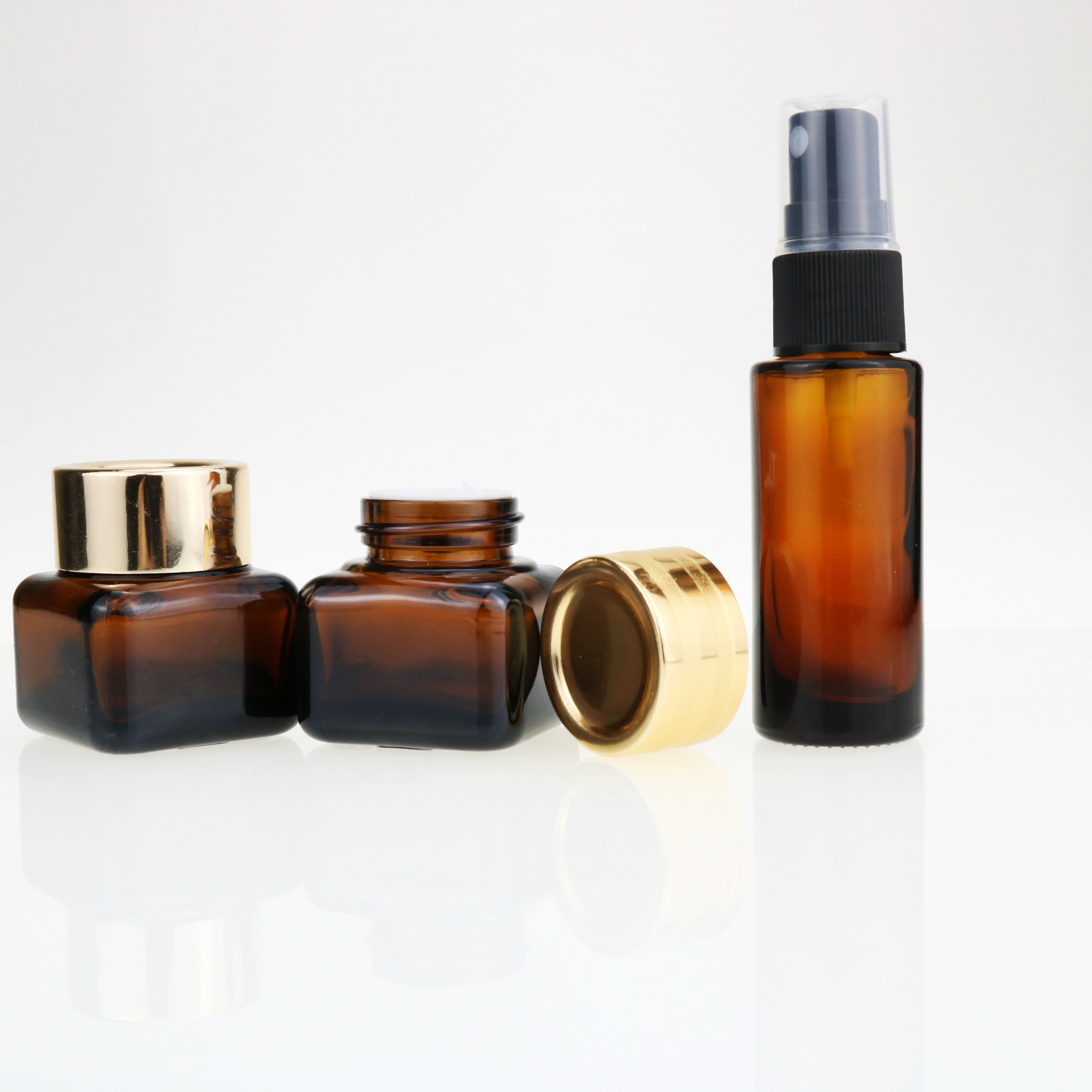 bamboo wood container and skincare packaging frosted glass cream jar