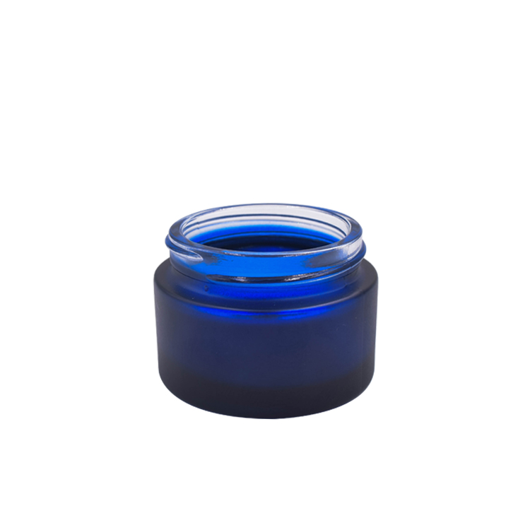 beautiful wholesale custom frosted dark blue cosmetic glass cream jar with rose golden lid