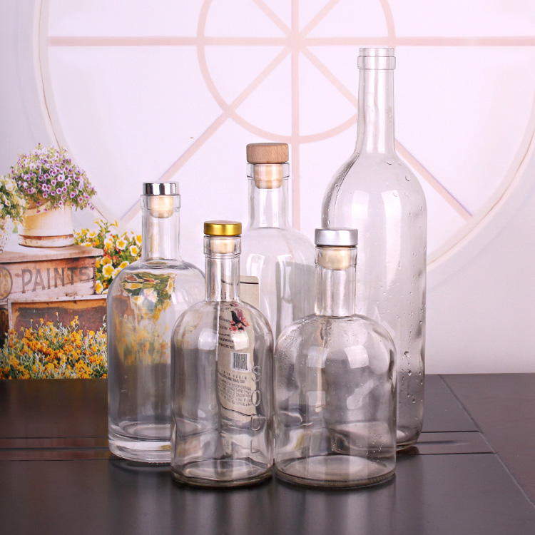 best seller round transparent 750ml glass wine bottle for liquor whisky with cork stopper