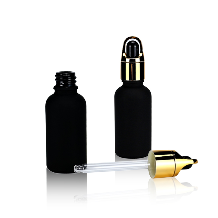 black dropper glass bottle with black cap for skincare packaging and cosmetic packaging