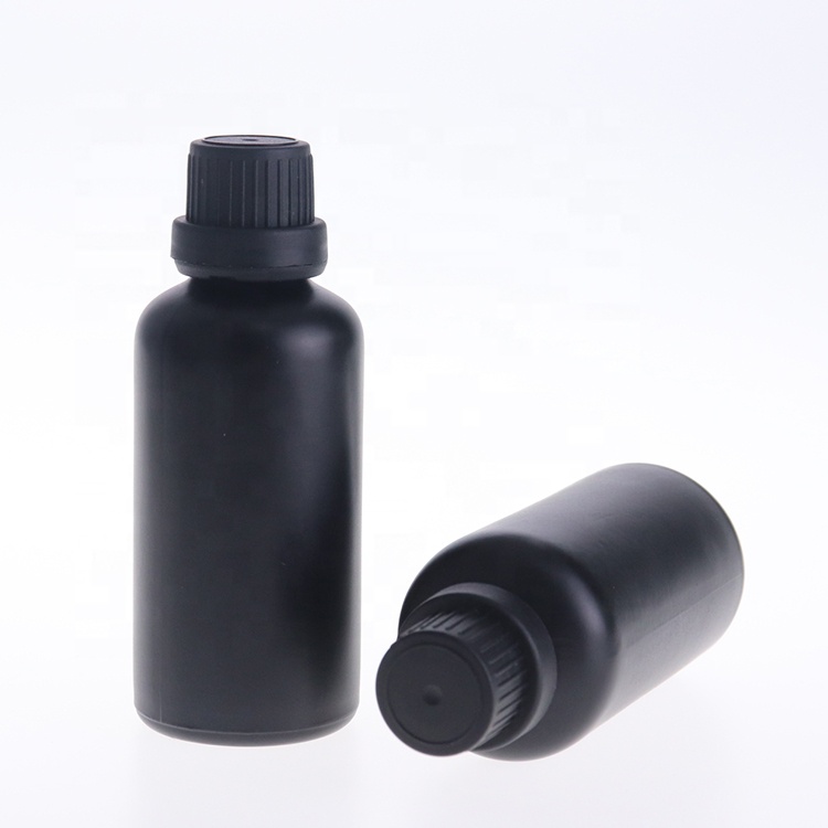 black glass boston round bottles with dripolator plug tamper proof evident cap glass bottle for essential oil orifice reducer