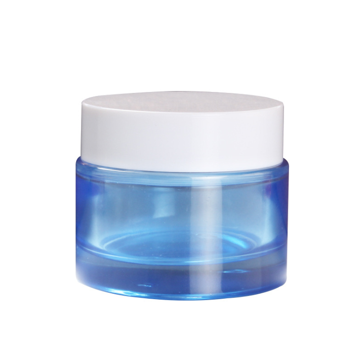 blue glass cosmetic facial cream jar with white black screw cap