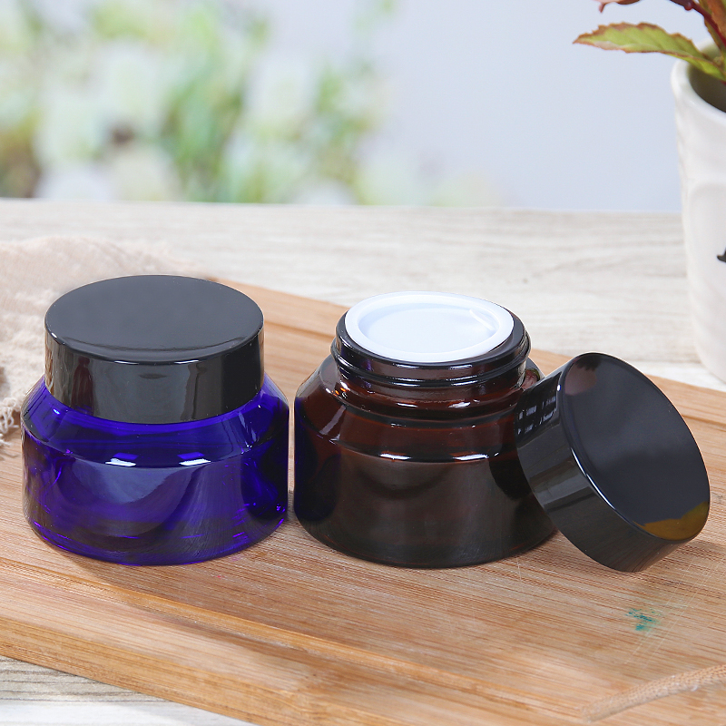 blue or amber color sloping shoulder cosmetic glass jar 15g 30g 50g with cap