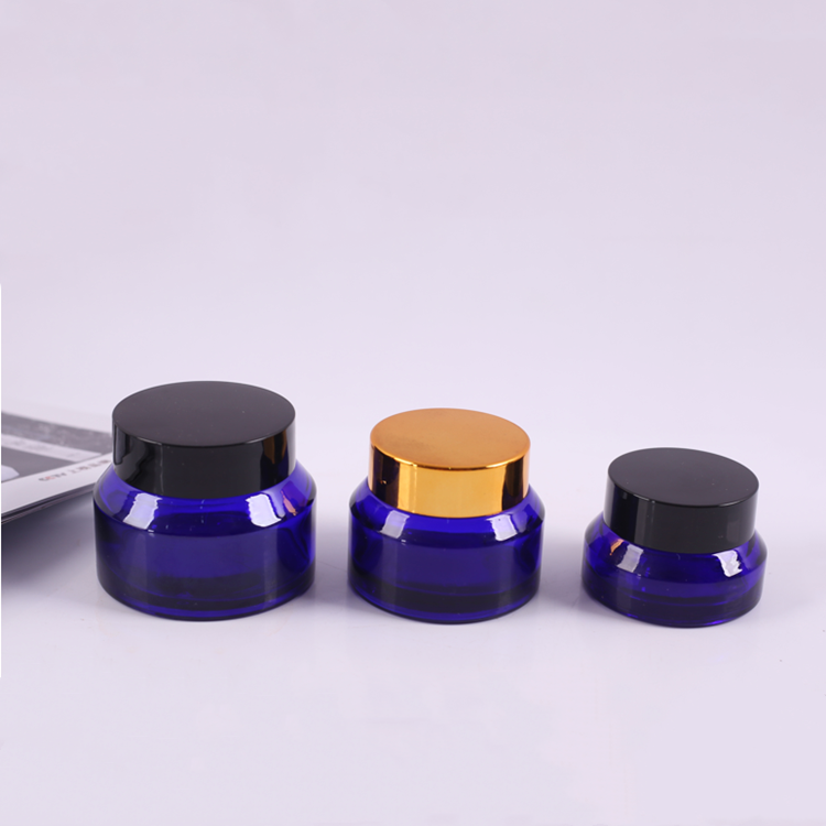 blue or amber color sloping shoulder cosmetic glass jar 15g 30g 50g with cap