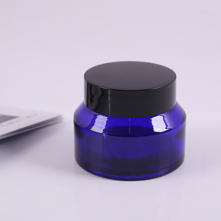 blue or amber color sloping shoulder cosmetic glass jar 15g 30g 50g with cap