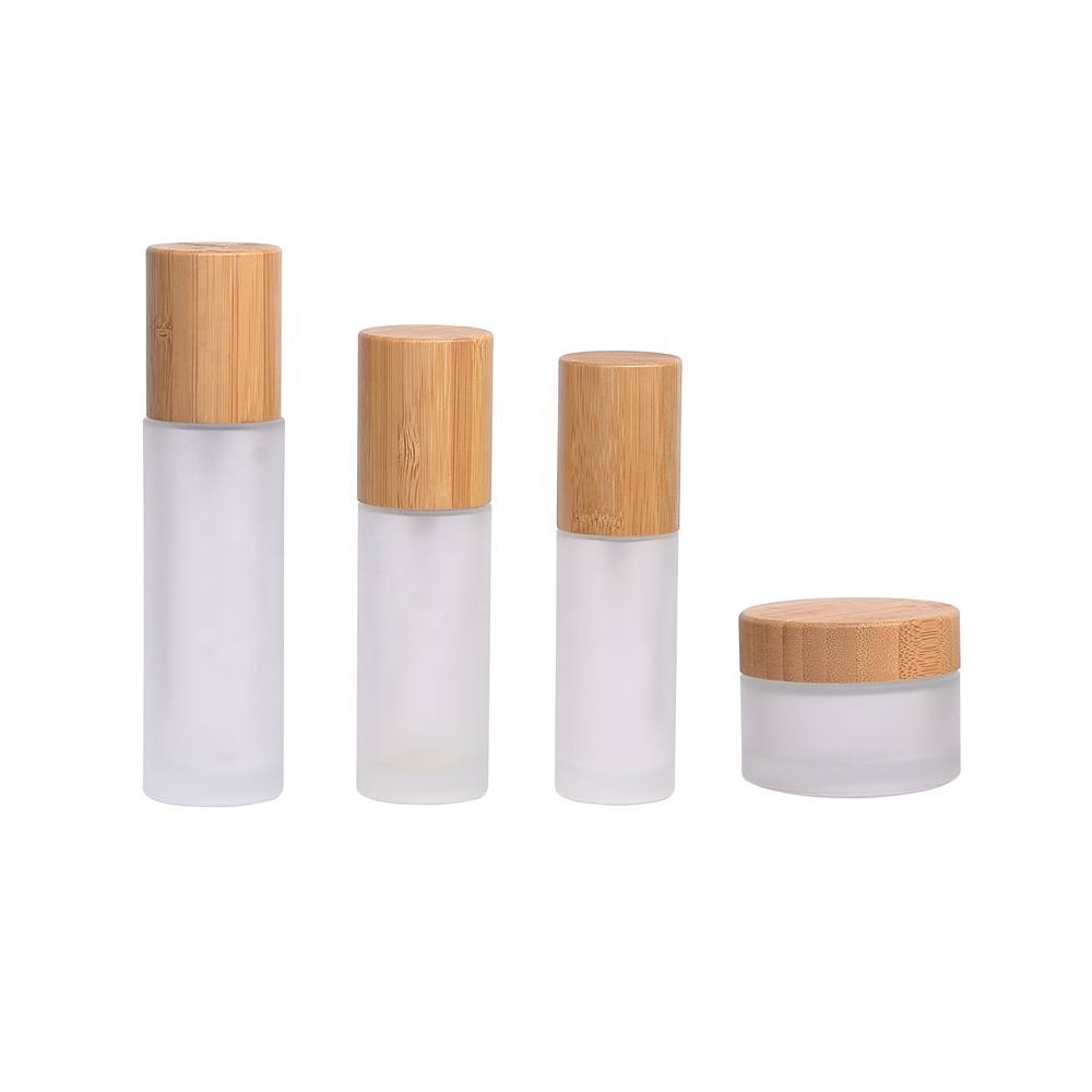 body lotion glass cosmetic spray pump bottles 30ml 50ml bamboo glass bottle with bamboo lids
