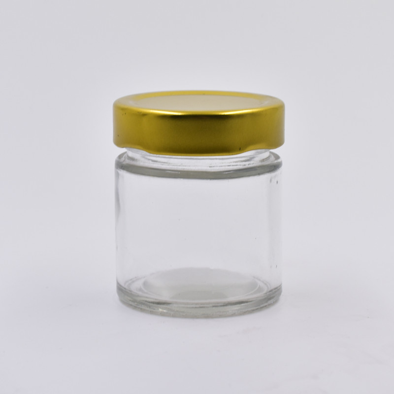 brand clear round 100ml glass storage jar with gold metal lid
