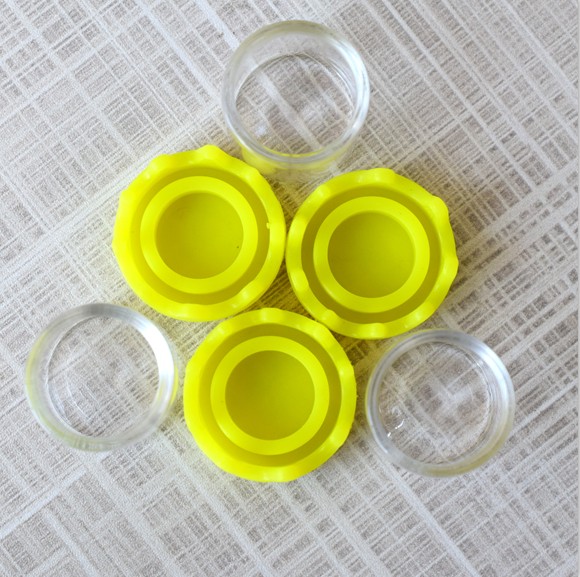 cbd jar packaging custom clear glass concentrate container jar with silicone press lid drippy insert cap flat top