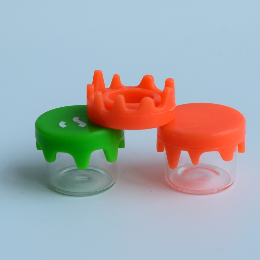 cbd jar packaging custom clear glass concentrate container jar with silicone press lid drippy insert cap flat top