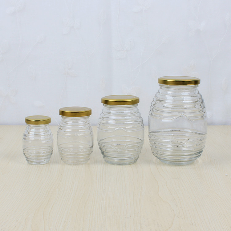 cheap 100ml 180ml 350ml 730ml Beehive honeycomb shape glass honey jars