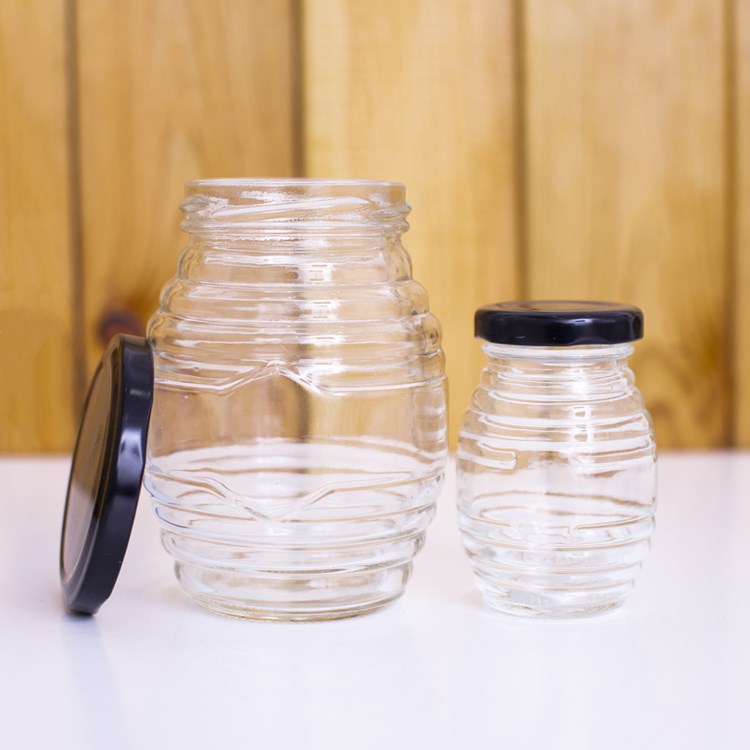 cheap 100ml 180ml 350ml 730ml Beehive honeycomb shape glass honey jars