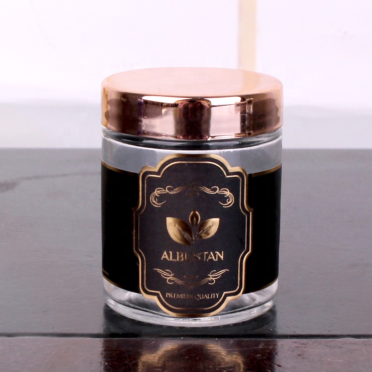cheap cylinder 200ml glass jar with customized logo round glass jar with rose gold lid