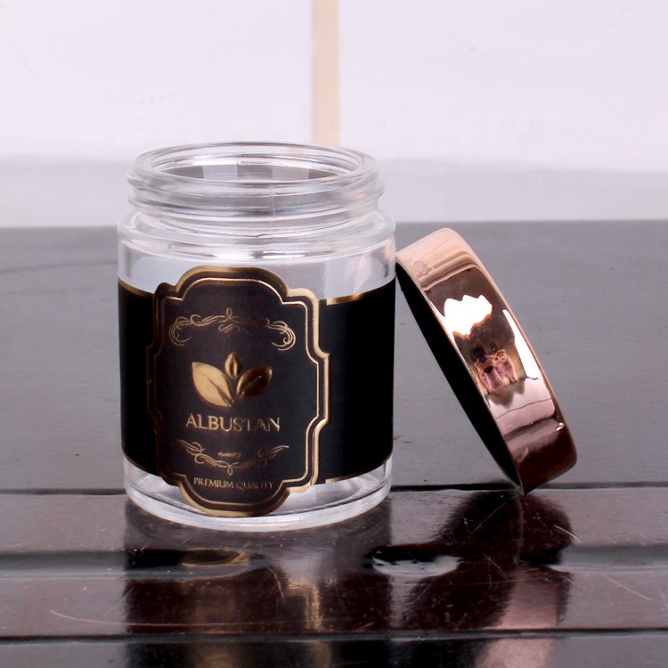cheap cylinder 200ml glass jar with customized logo round glass jar with rose gold lid