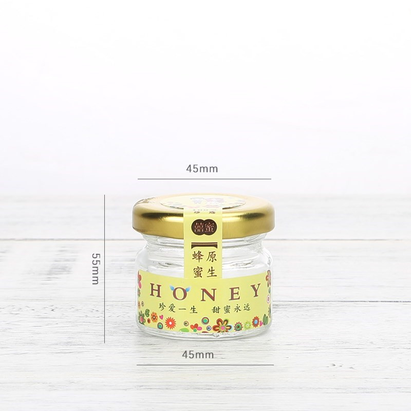 cheap mini 1oz round transparent glass jar for honey with metal lid