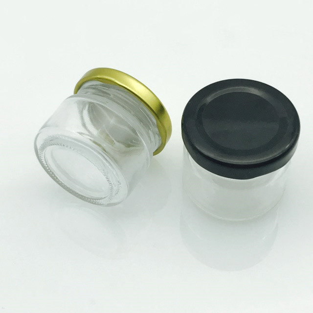 cheap mini 1oz round transparent glass jar for honey with metal lid