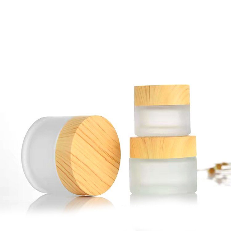 china factory high quality Frosted thickened Glass Cream Bottle Jar with wood grain cap and PP hand pad