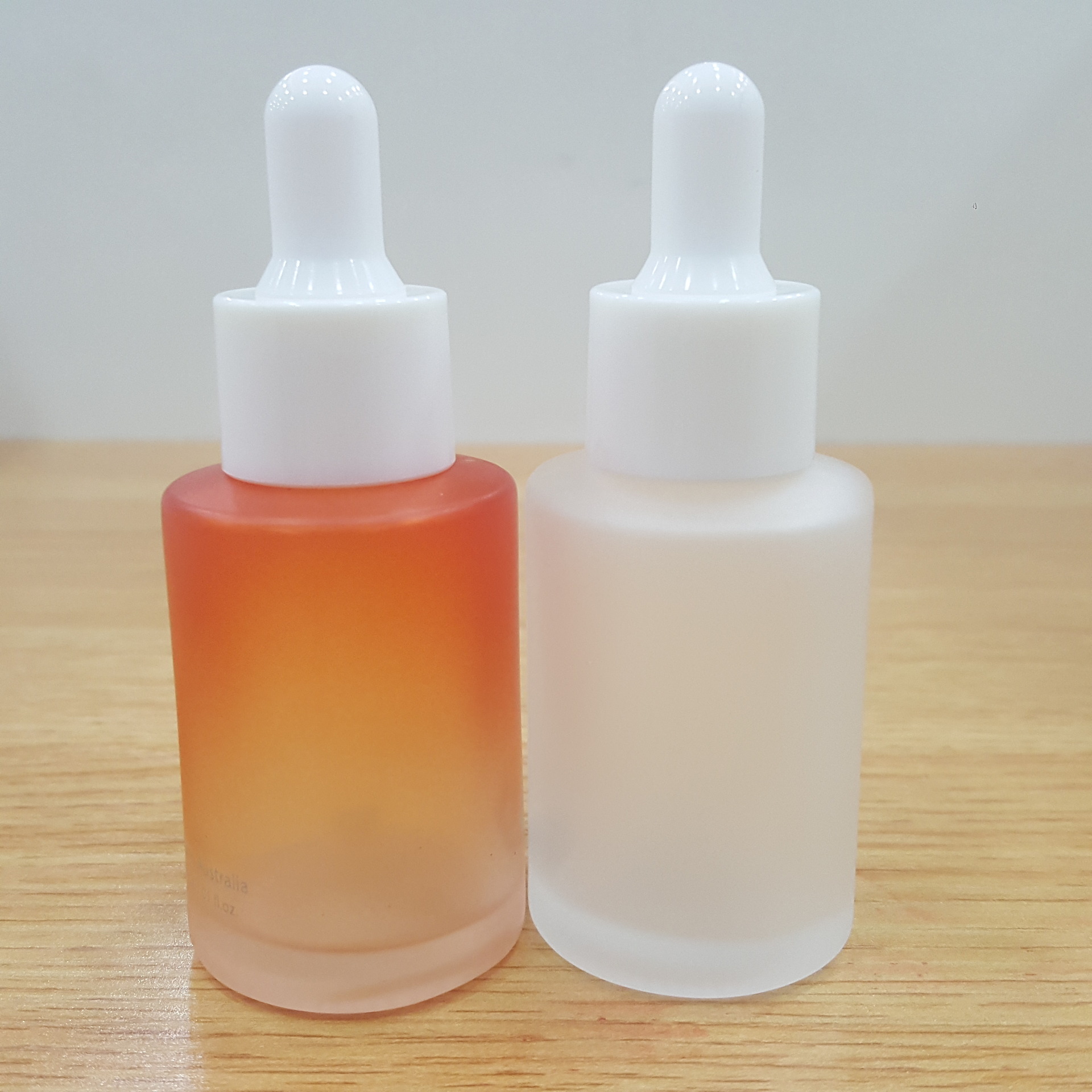 china manufacturer low price custom cosmetic essential oil frosted perfume pharmaceutical clear glass dropper bottle