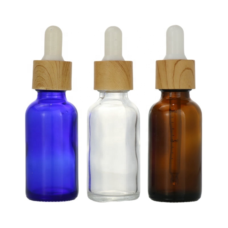 clear amber blue boston glass bottle with bamboo cap