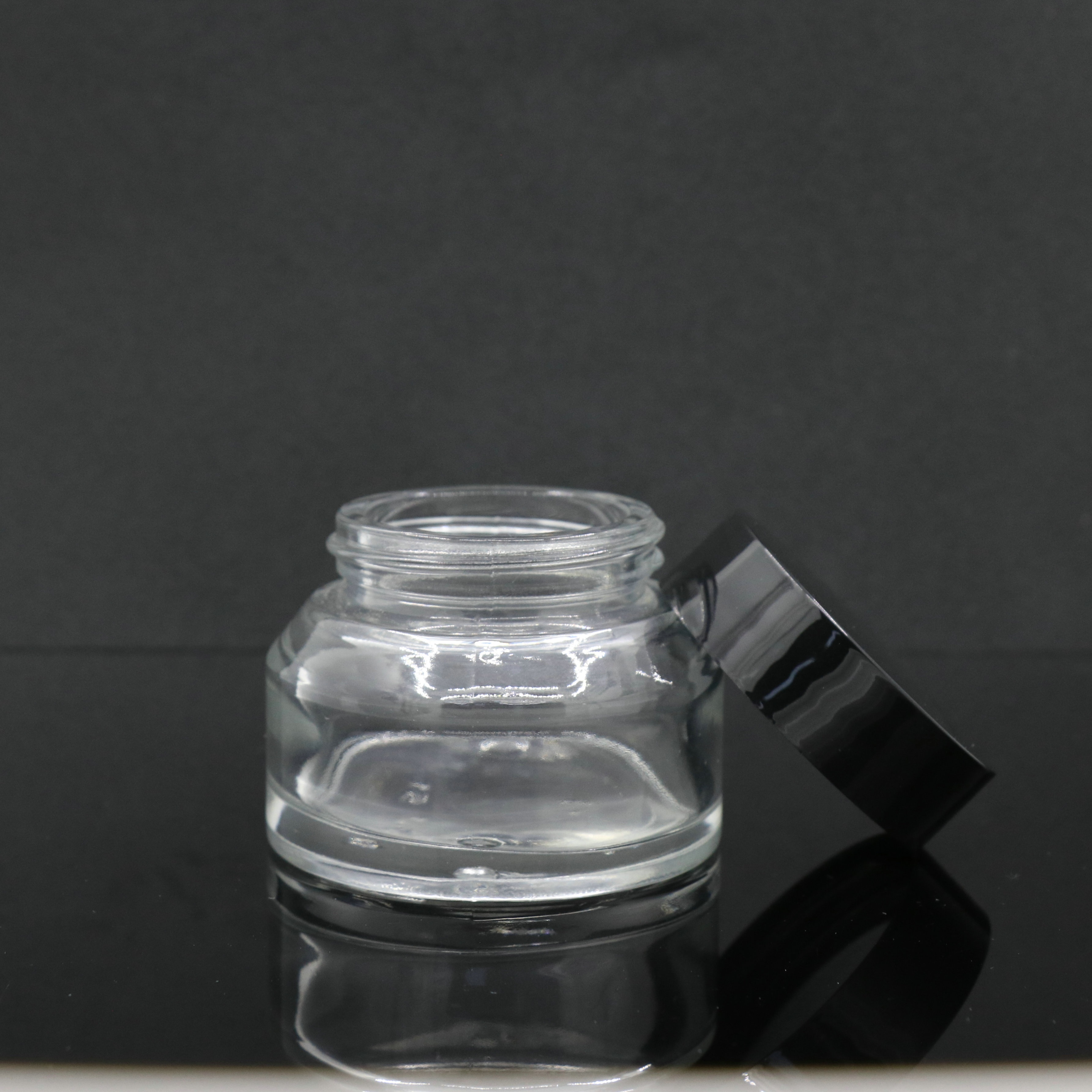 clear child resistant cosmetic glass jar with childproof cap for face cream packaging custom