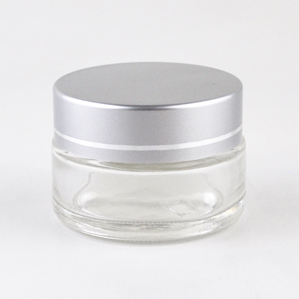 clear cream packaging 30g 1 oz round cosmetic glass jars with silver lid for eye cream