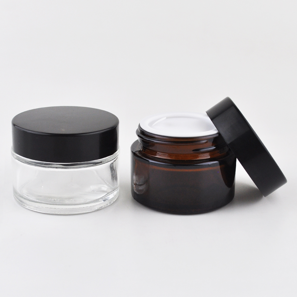 clear cream packaging 30g 1 oz round cosmetic glass jars with silver lid for eye cream